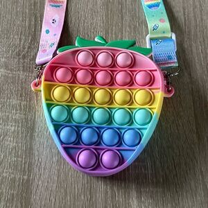 NWOT … Rainbow “Strawberry” Pop It Purse